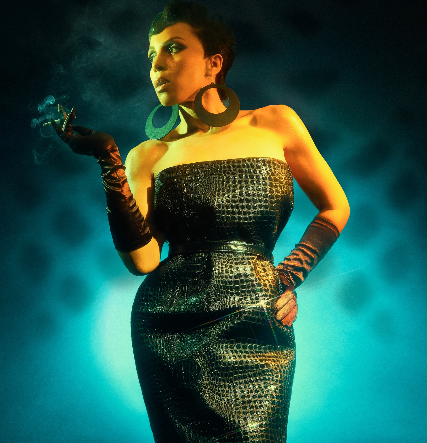 Full-length cinematic fashion portrait in teal and amber light